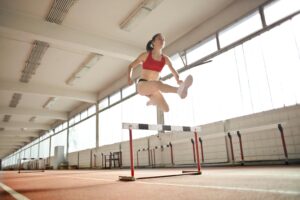 Young adults running and weightlifting, showcasing fitness routines for people in their 20s and 30s.